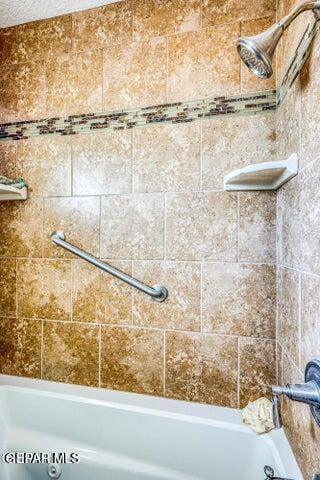1944 Ratner Cir, El Paso, TX 79936 - bathroom featuring washtub / shower combination