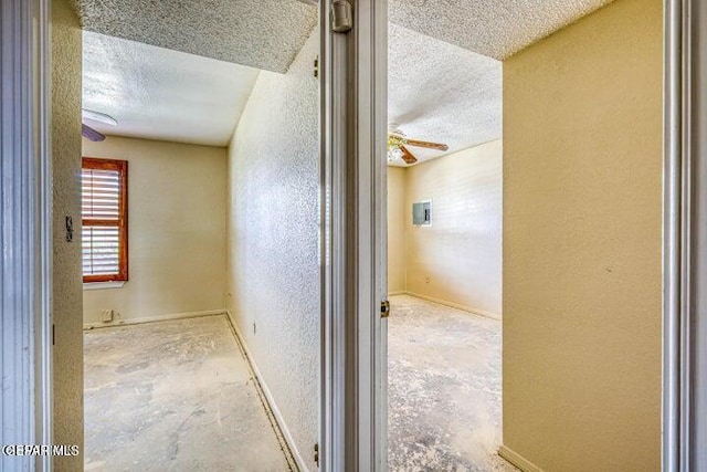 1944 Ratner Cir, El Paso, TX 79936 - hall with a textured wall, a textured ceiling, and unfinished concrete flooring