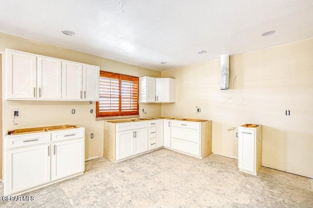 1944 Ratner Cir, El Paso, TX 79936 - kitchen featuring white cabinetry