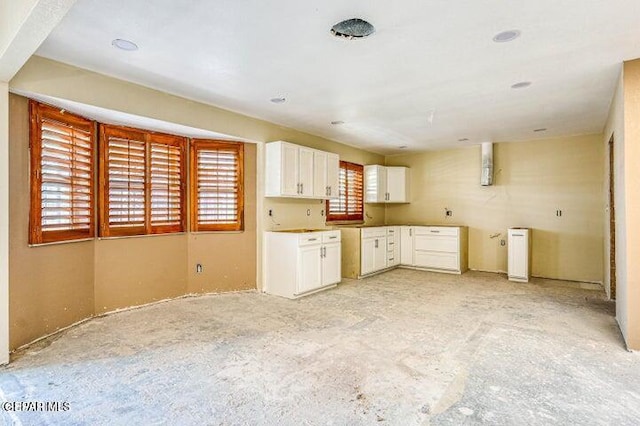 1944 Ratner Cir, El Paso, TX 79936 - kitchen featuring white cabinetry