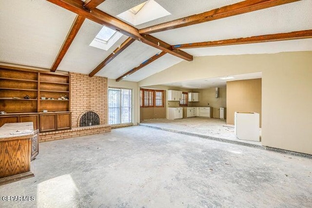 1944 Ratner Cir, El Paso, TX 79936 - unfurnished living room featuring a skylight and a brick fireplace