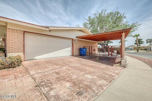 1944 Ratner Cir, El Paso, TX 79936 - view of front of property featuring decorative driveway, brick siding, and an attached garage