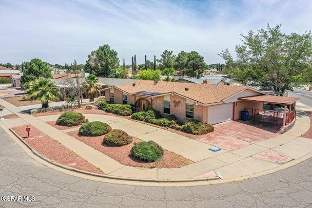 1944 Ratner Cir, El Paso, TX 79936 - ranch-style house with driveway and an attached garage