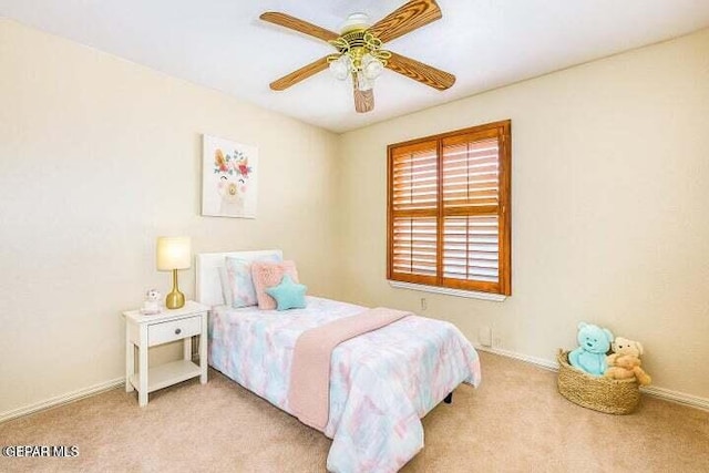 1944 Ratner Cir, El Paso, TX 79936 - carpeted bedroom featuring baseboards and a ceiling fan