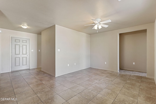 708 Cora Ruecker, El Paso, TX 79928 - spare room with light tile patterned floors and a ceiling fan