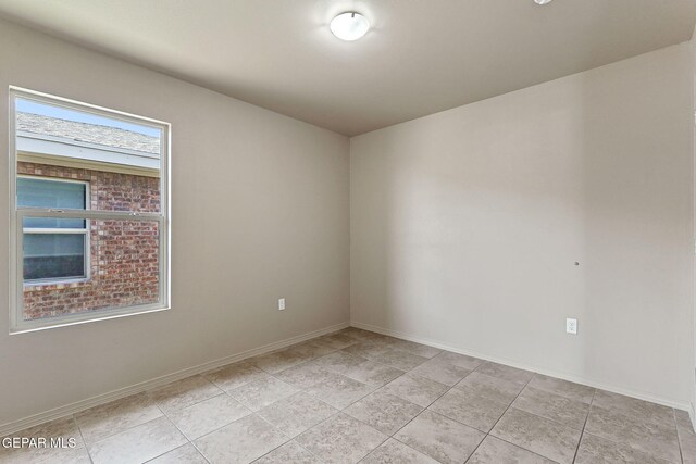 708 Cora Ruecker, El Paso, TX 79928 - unfurnished room with baseboards and light tile patterned floors