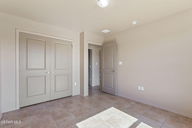 708 Cora Ruecker, El Paso, TX 79928 - unfurnished bedroom featuring a closet and light tile patterned flooring