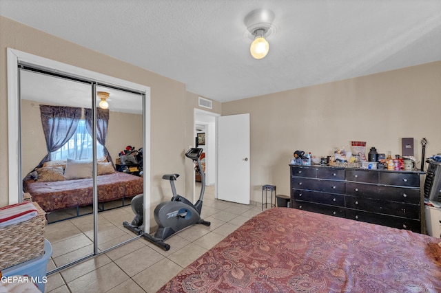 11749 Socorro Rd, Socorro, TX 79927 - tiled bedroom with a closet