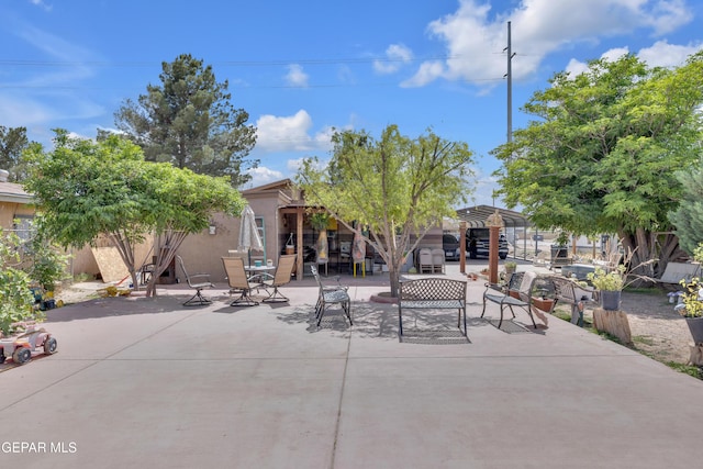 11749 Socorro Rd, Socorro, TX 79927 - view of patio with a pergola and an outdoor hangout area