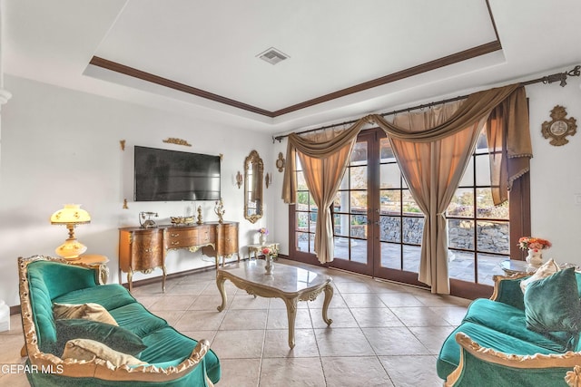 41 Sun Point Ln, El Paso, TX 79912 - living area with a tray ceiling, french doors, crown molding, and tile patterned floors