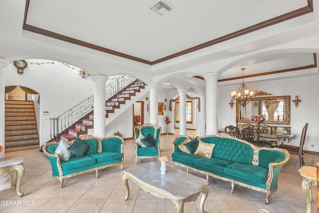 41 Sun Point Ln, El Paso, TX 79912 - living area featuring a tray ceiling, stairs, a chandelier, tile patterned floors, and crown molding