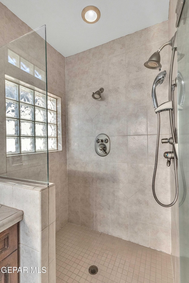 41 Sun Point Ln, El Paso, TX 79912 - bathroom featuring a walk in shower and vanity