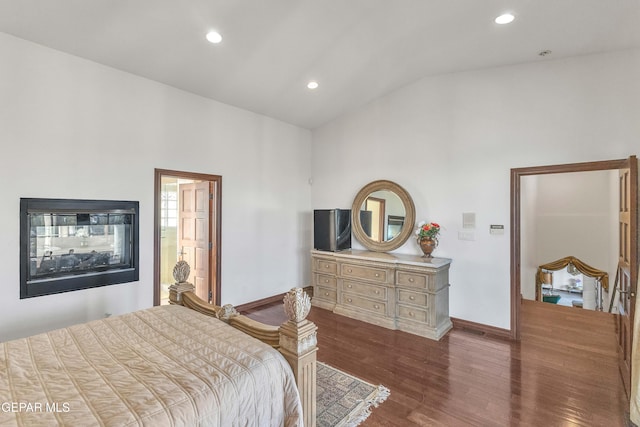 41 Sun Point Ln, El Paso, TX 79912 - bedroom with vaulted ceiling, dark wood-style floors, and recessed lighting