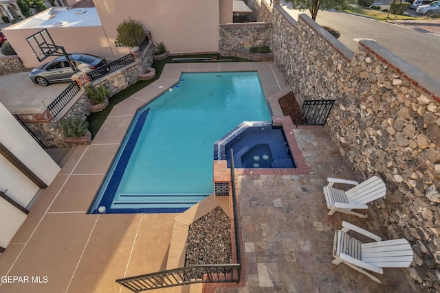 41 Sun Point Ln, El Paso, TX 79912 - view of swimming pool with a pool with connected hot tub
