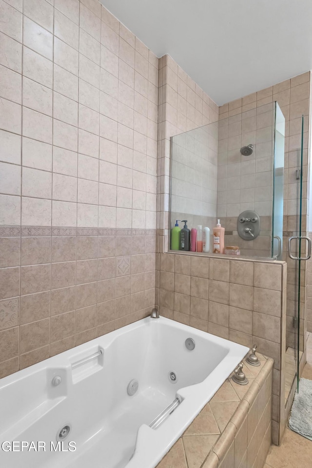 41 Sun Point Ln, El Paso, TX 79912 - full bath featuring a stall shower, a whirlpool tub, and tile patterned floors