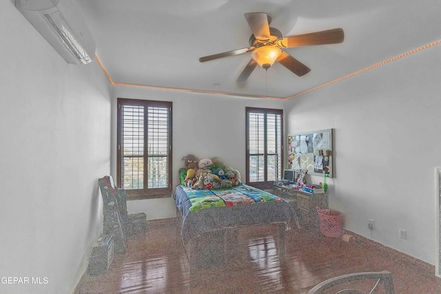 41 Sun Point Ln, El Paso, TX 79912 - bedroom featuring an AC wall unit, multiple windows, ornamental molding, and ceiling fan