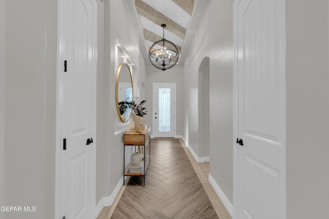 7424 Cimarron Gap Dr, El Paso, TX 79911 - entrance foyer featuring a chandelier, beam ceiling, and light wood finished floors