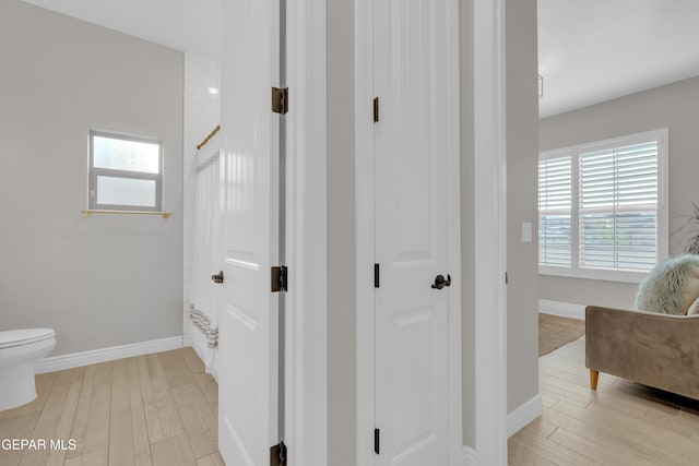 7424 Cimarron Gap Dr, El Paso, TX 79911 - corridor with healthy amount of natural light and light wood-style floors