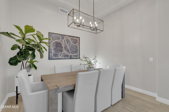 7424 Cimarron Gap Dr, El Paso, TX 79911 - dining room with a chandelier and light wood-style floors