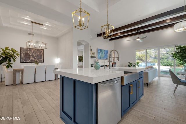 7424 Cimarron Gap Dr, El Paso, TX 79911 - kitchen with dishwasher, blue cabinets, a chandelier, beamed ceiling, and light countertops