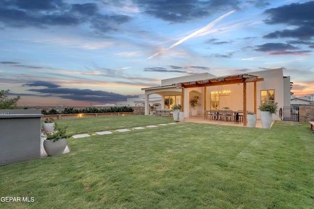 7424 Cimarron Gap Dr, El Paso, TX 79911 - fenced yard featuring a patio area
