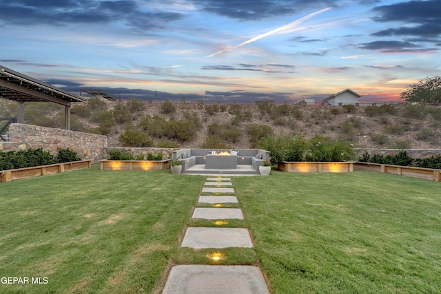 7424 Cimarron Gap Dr, El Paso, TX 79911 - fenced backyard with outdoor lounge area and a patio