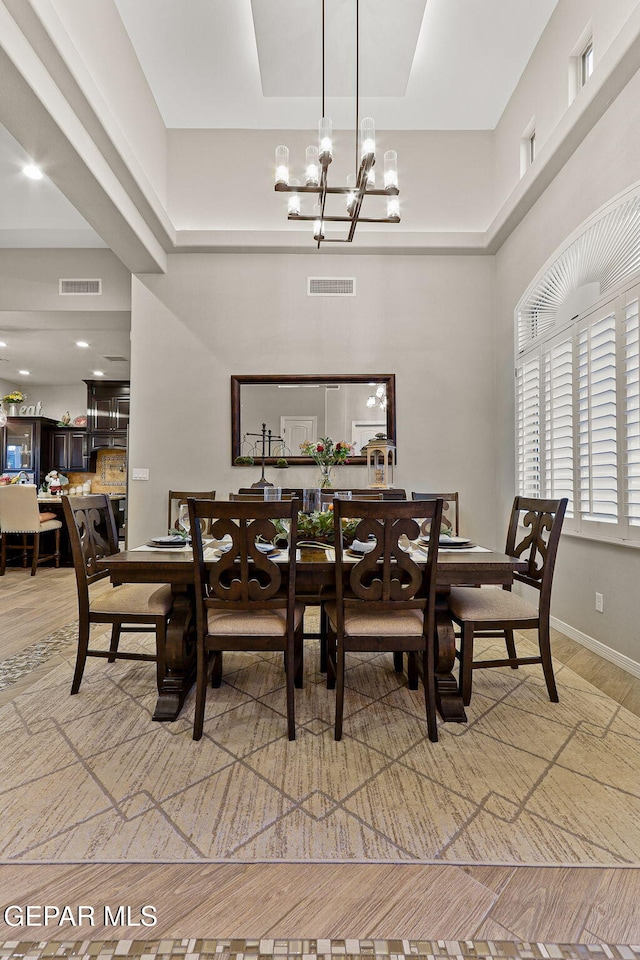 12289 Freshwater Dr, El Paso, TX 79928 - dining room with a chandelier and a high ceiling