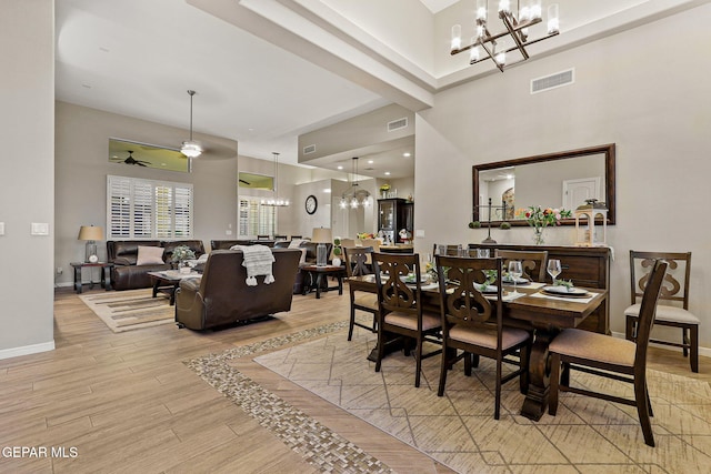 12289 Freshwater Dr, El Paso, TX 79928 - dining space featuring a chandelier and light wood-style flooring