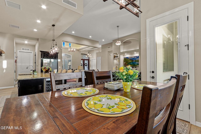 12289 Freshwater Dr, El Paso, TX 79928 - dining room with a chandelier, recessed lighting, and light wood-style flooring