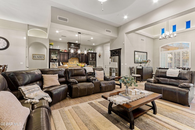 12289 Freshwater Dr, El Paso, TX 79928 - living area featuring light wood finished floors, recessed lighting, and a high ceiling