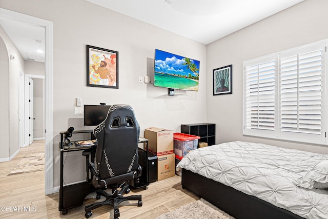 12289 Freshwater Dr, El Paso, TX 79928 - bedroom with wood finished floors and an office area
