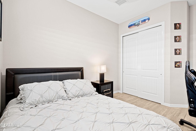 12289 Freshwater Dr, El Paso, TX 79928 - bedroom with wood finished floors and a closet