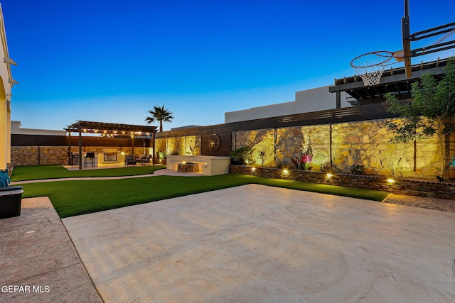 12289 Freshwater Dr, El Paso, TX 79928 - view of patio / terrace with exterior kitchen and a pergola