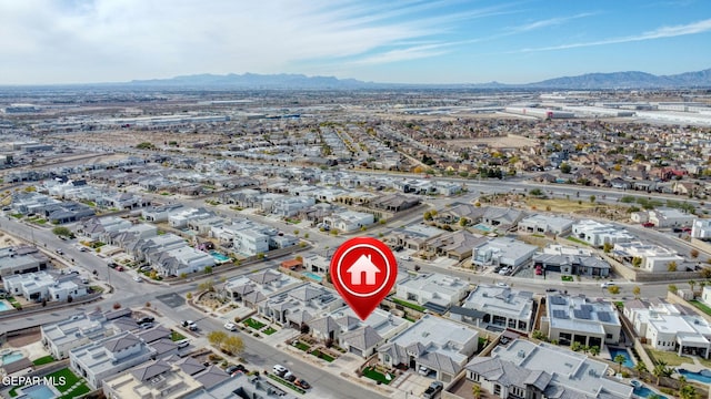 12289 Freshwater Dr, El Paso, TX 79928 - aerial view of property's location featuring a mountain backdrop and nearby suburban area