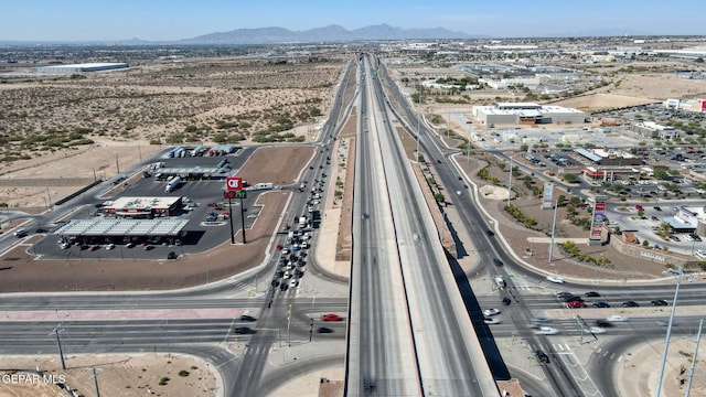 12289 Freshwater Dr, El Paso, TX 79928 - drone / aerial view of a main thoroughfare and mountains
