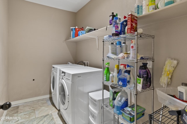 2057A Howard Jones, El Paso, TX 79938 - washroom with independent washer and dryer and baseboards