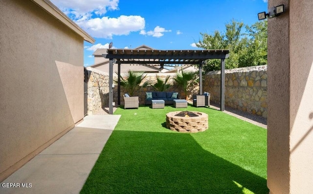 2057A Howard Jones, El Paso, TX 79938 - fenced backyard featuring a pergola and an outdoor living space with a fire pit