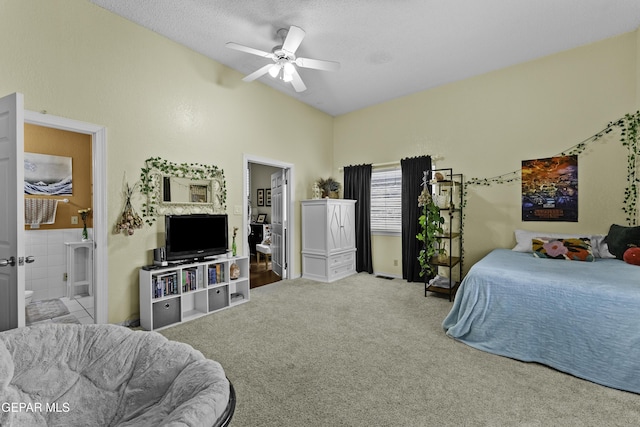 34 Kingery Dr, El Paso, TX 79902 - bedroom with carpet flooring, vaulted ceiling, ensuite bath, and ceiling fan