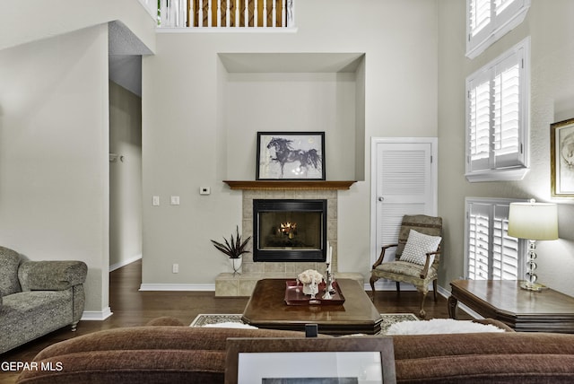 34 Kingery Dr, El Paso, TX 79902 - living area with a tile fireplace and wood finished floors