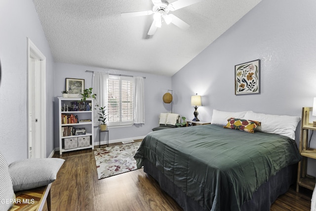34 Kingery Dr, El Paso, TX 79902 - bedroom with a textured ceiling, wood finished floors, vaulted ceiling, and ceiling fan
