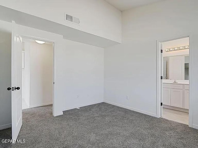 14309 Seth Payne Dr, El Paso, TX 79928 - unfurnished bedroom with carpet flooring and ensuite bathroom