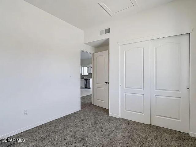 14309 Seth Payne Dr, El Paso, TX 79928 - unfurnished bedroom with dark carpet and a closet