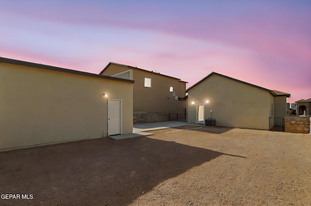 14309 Seth Payne Dr, El Paso, TX 79928 - back of property with stucco siding and a patio area