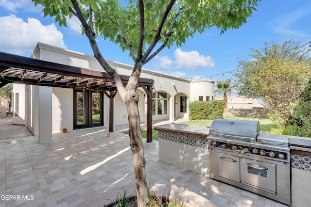 5833 Sundale Rd, El Paso, TX 79912 - view of patio with exterior kitchen