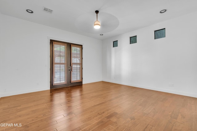 5833 Sundale Rd, El Paso, TX 79912 - spare room with ceiling fan, french doors, and light wood-style floors