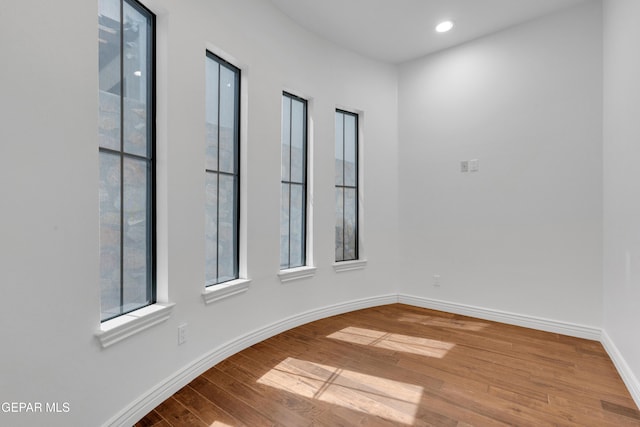 5833 Sundale Rd, El Paso, TX 79912 - unfurnished room with wood-type flooring, healthy amount of natural light, and recessed lighting