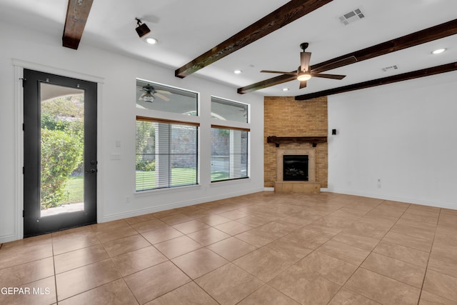 5833 Sundale Rd, El Paso, TX 79912 - unfurnished living room with ceiling fan, beam ceiling, light tile patterned floors, a large fireplace, and recessed lighting