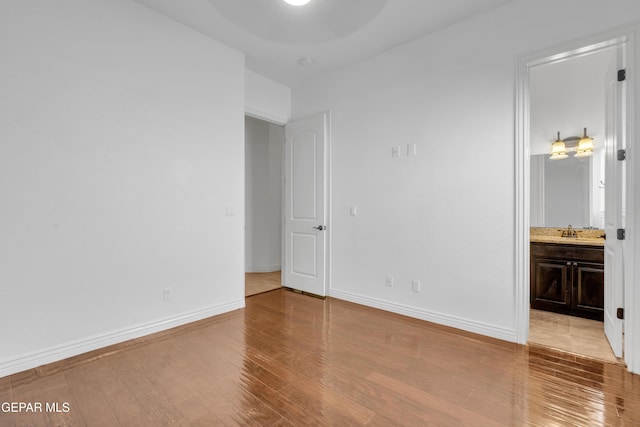5833 Sundale Rd, El Paso, TX 79912 - spare room with wood finished floors and a ceiling fan
