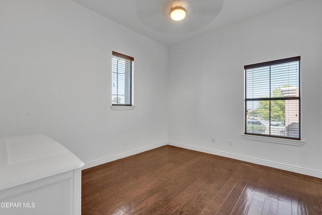 5833 Sundale Rd, El Paso, TX 79912 - empty room featuring dark wood finished floors and a ceiling fan