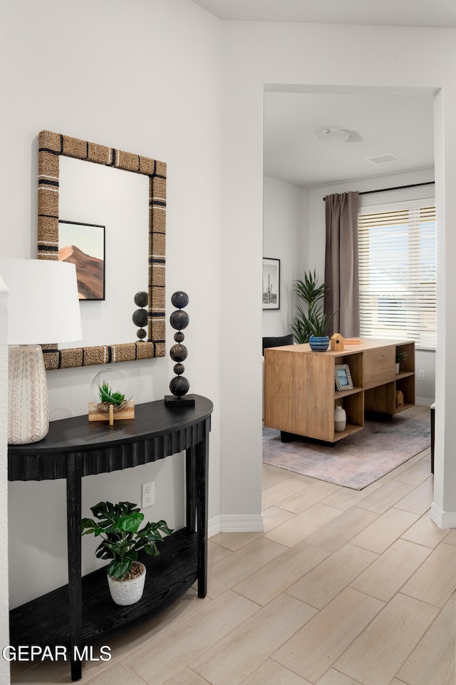2204 Small Mountain Place, El Paso, TX 79911 - corridor featuring wood tiled floors and baseboards